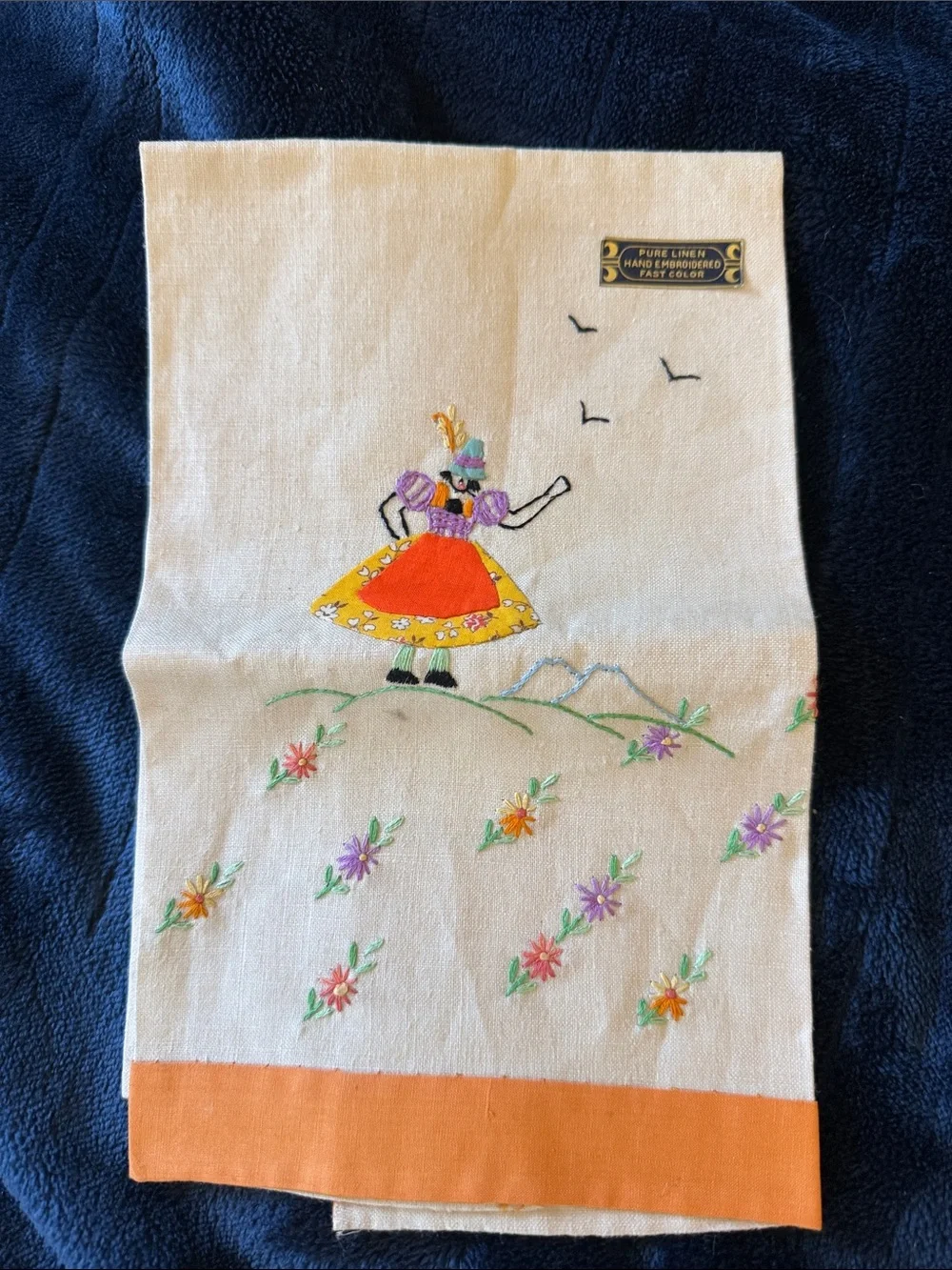 Embroidered Linen Hand Towel with Orange Border and Multicolor Motif